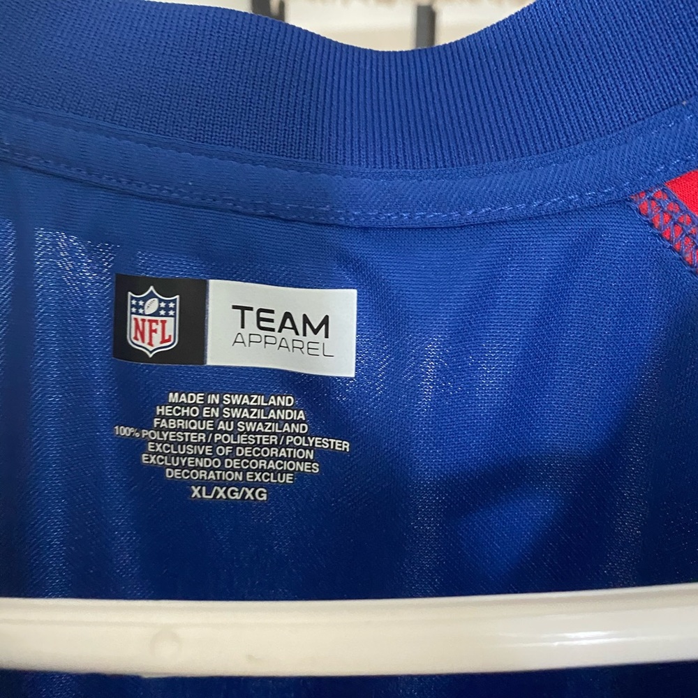 N.Y. Giants polo shirt.